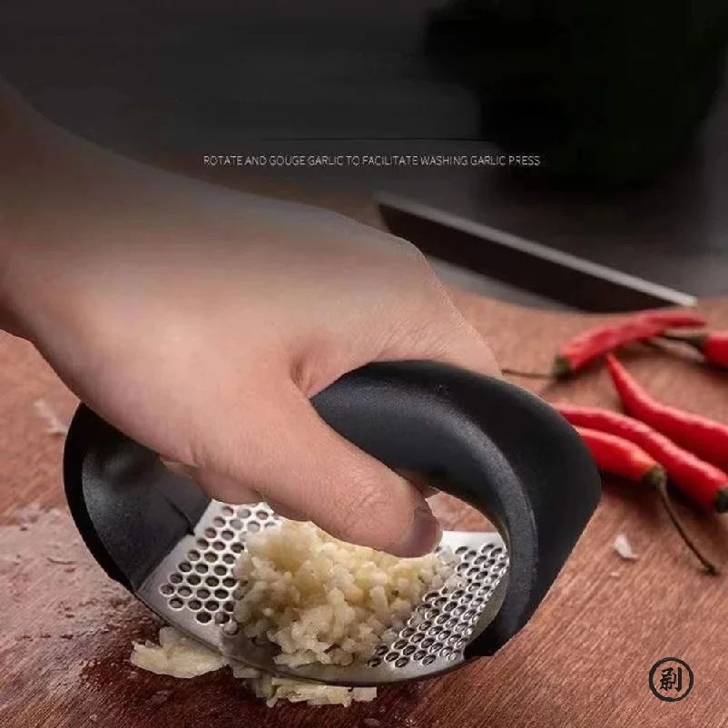 Stainless Steel Garlic Press C - Quirky Kitchen Gadgets reseña y precio
